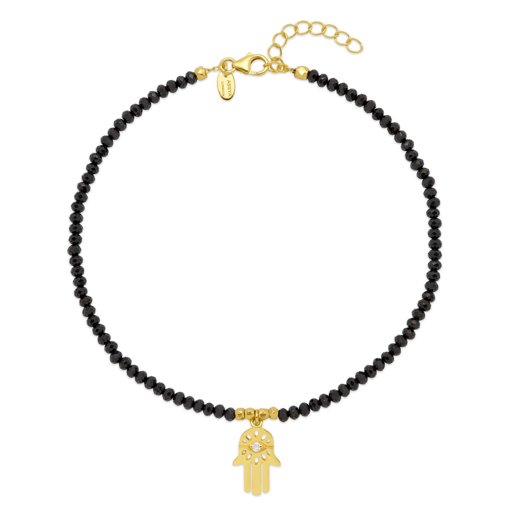 A black beaded anklet with a 18ct gold plated vermeil on silver Hamsa charm and black spinel gemstone pendants. with lobster charm