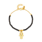 Adjustable 18ct vermeil gold-plated sterling silver bracelet with black spinel and white zircon gemstone, featuring a Hamsa charm.