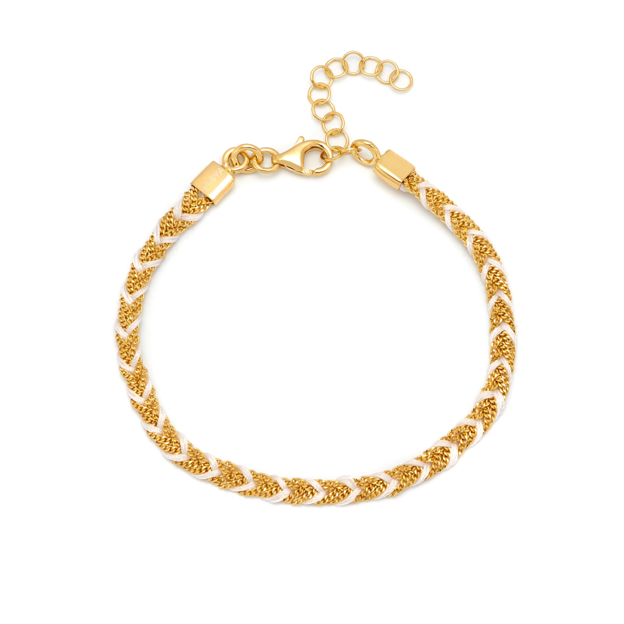 A 18ct gold plated vermeil and white silk braided Kuna bracelet with a lobster clasp closure.