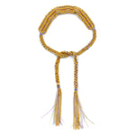 18ct gold plated vermeil on silver with lilac purple silk thread weaved bracelet with a tie closure and tassels.