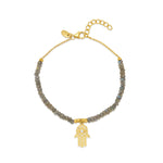 18ct gold plated bracelet with a hamsa charm with white zircon on a labradorite chain
