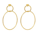 A pair of gold hoop earrings