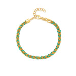A 18ct gold plated vermeil and green silk braided Kuna bracelet with a lobster clasp closure.