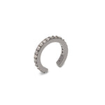 silver ear cuff with black and white zircon crystals.