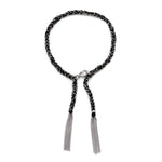 a sterling silver and black silk thread tassel bracelet with lobster clasp