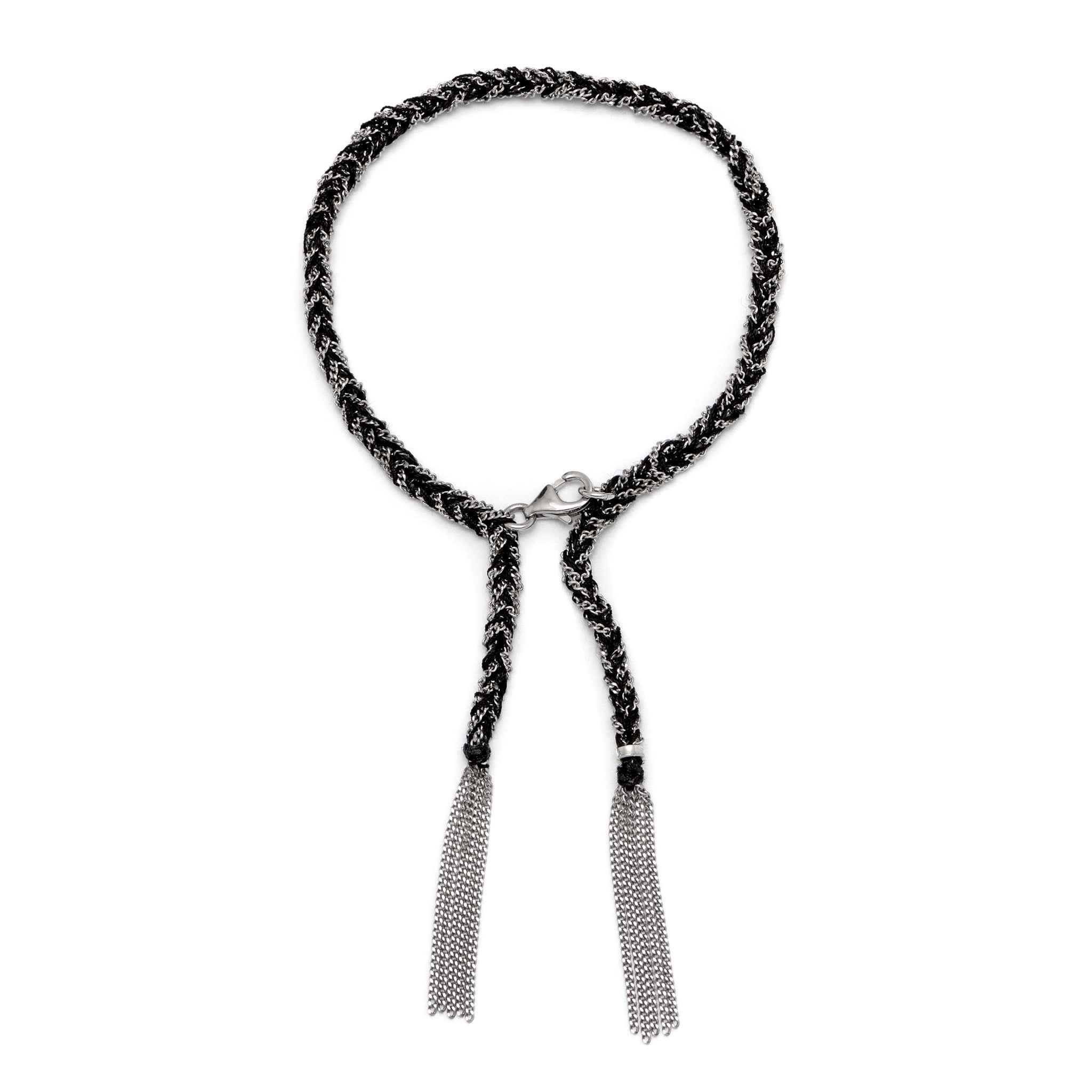 a sterling silver and black silk thread tassel bracelet with lobster clasp