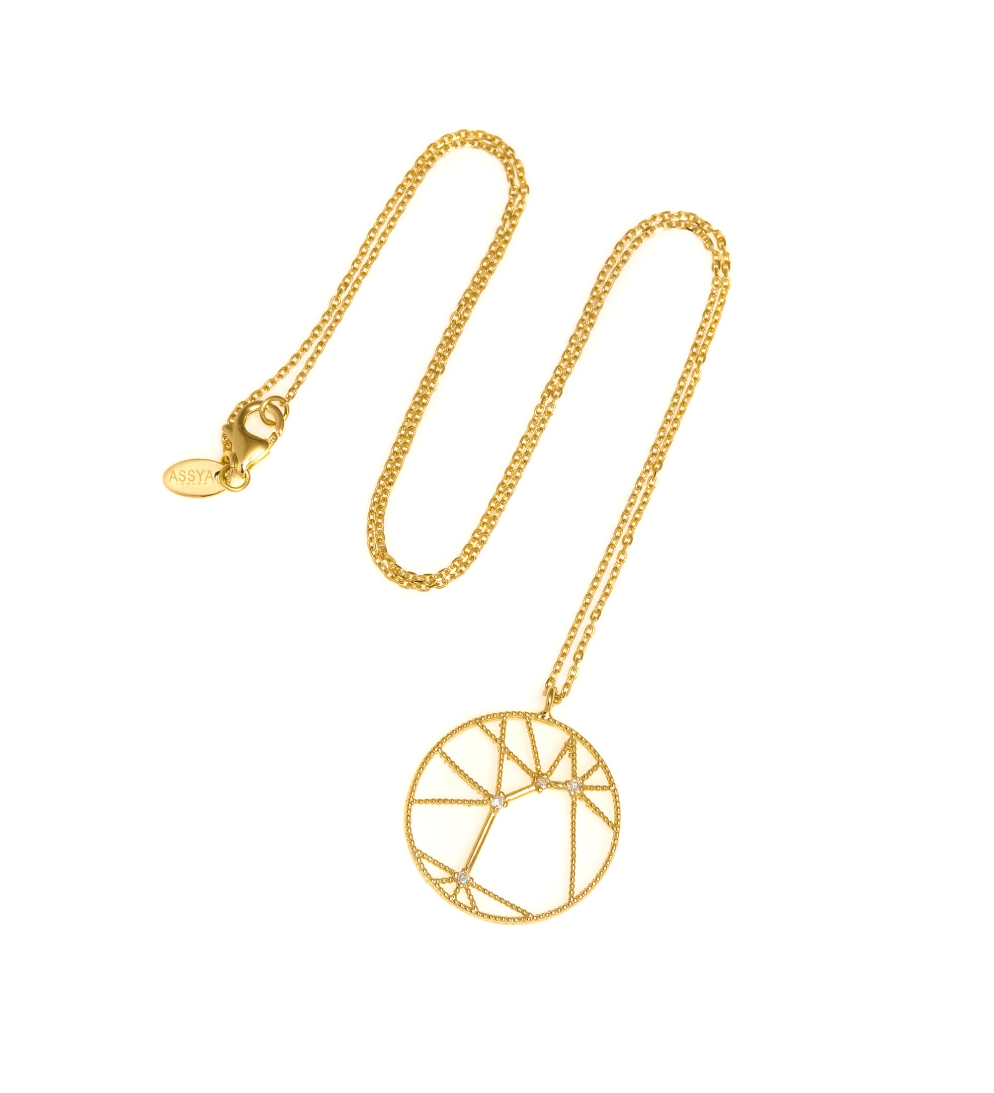 An 18ct gold necklace with a white diamond pendant in the shape of a star sign, known as the constellation for aries