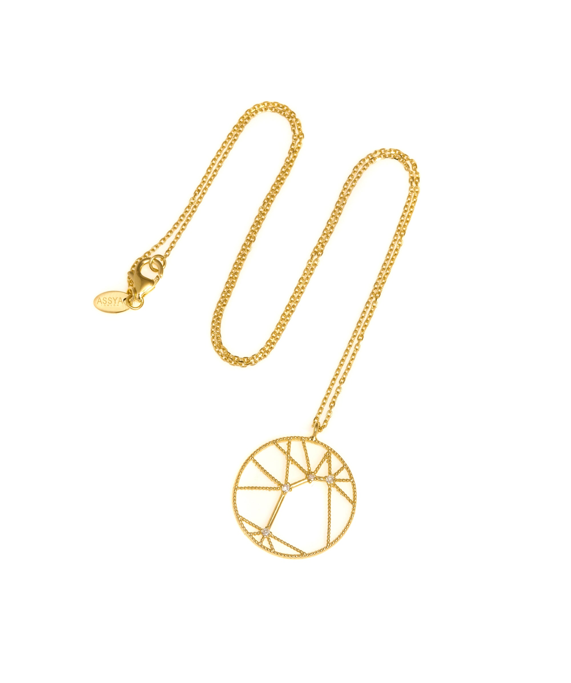 An 18ct gold necklace with a white diamond pendant in the shape of a star sign, known as the constellation for aries