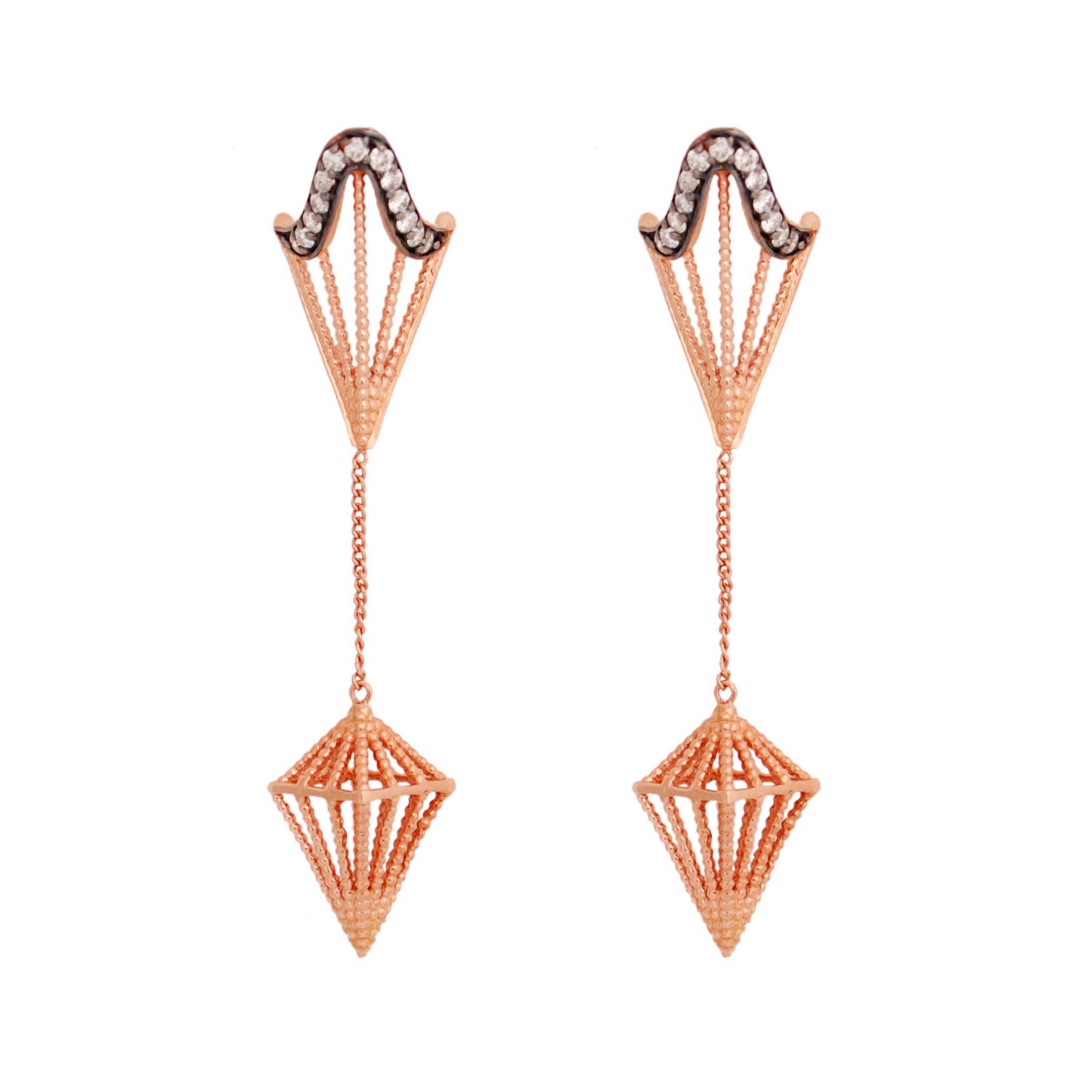 A pair of rose gold vermeil arrow-shaped earrings embellished with white diamonds, with a black rhodium background.