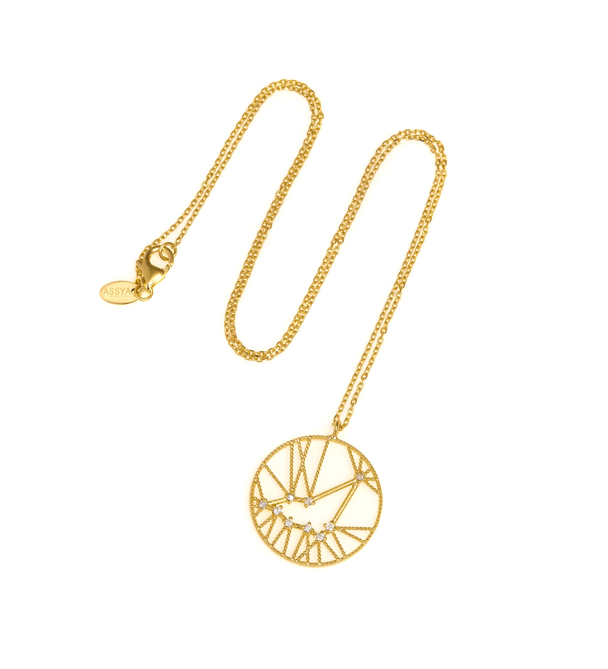 An 18ct gold necklace with a white diamond pendant in the shape of a star sign, known as the constellation for Capricorn