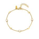 A 18ct gold plated vermeil bracelet with white zircon studs in a chain link design, featuring moon and star motifs.