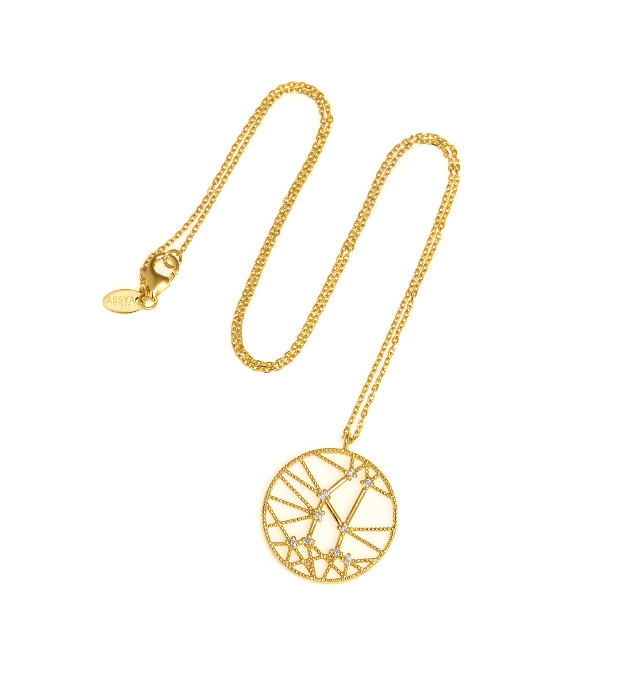 An 18ct gold necklace with a white diamond pendant in the shape of a star sign, known as the constellation for gemini