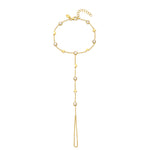 18ct gold plated vermeil on silver hand bracelet with attached ring. With natural zircon crystals and a moon and star motif of charms.