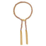 18 ct gold plated vermeil chain with lilac silk thread woven bracelt with lobster clasp and tassels.