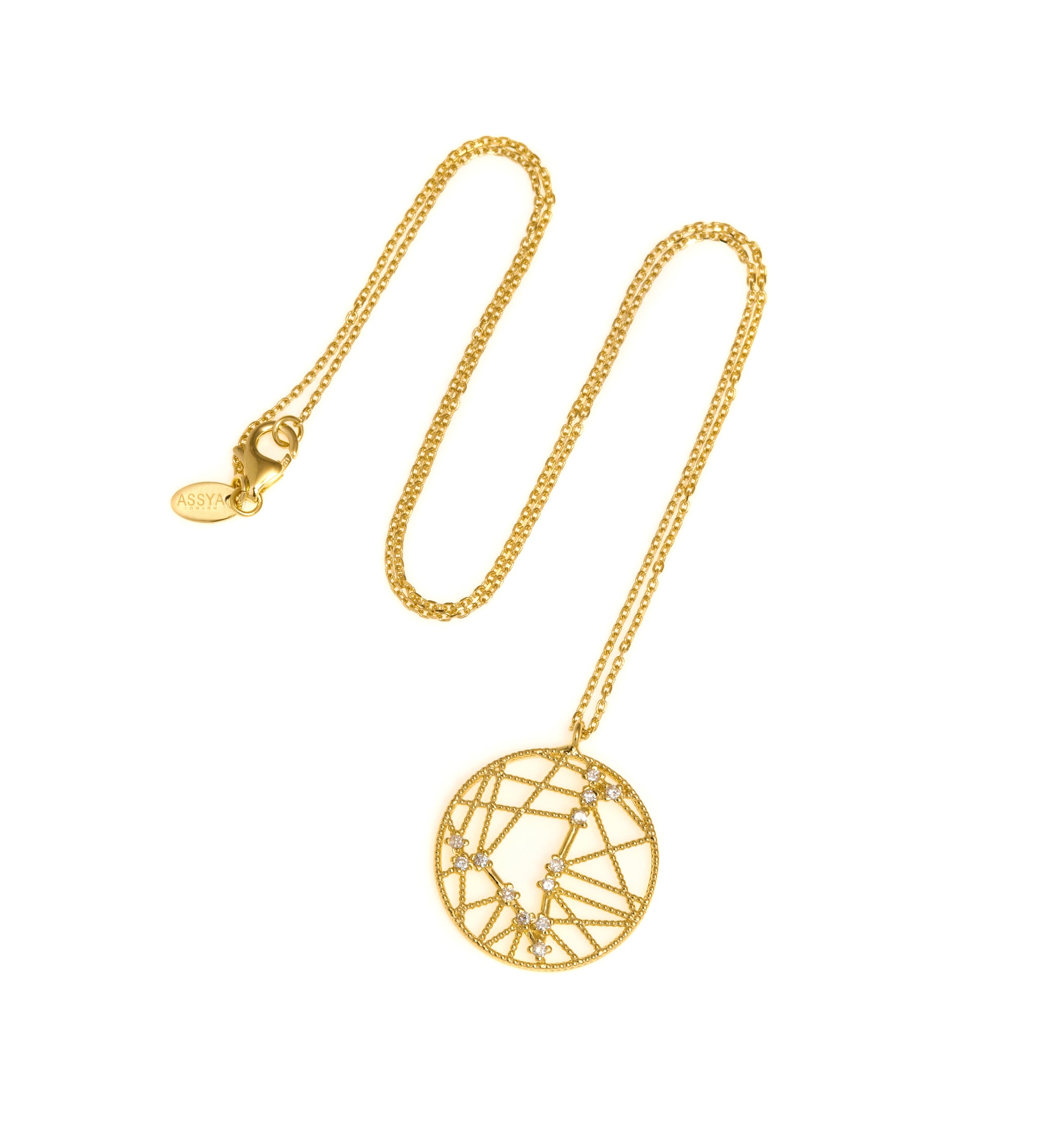 An 18ct gold necklace with a white diamond pendant in the shape of a star sign, known as the constellation for pisces