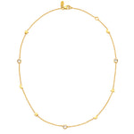 A 18ct gold plated vermeil necklace with natural white Zircon studs in the shape of moons and stars.