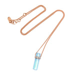 18ct gold plated vermeil with blue topaz crystal and whit diamond pendant.