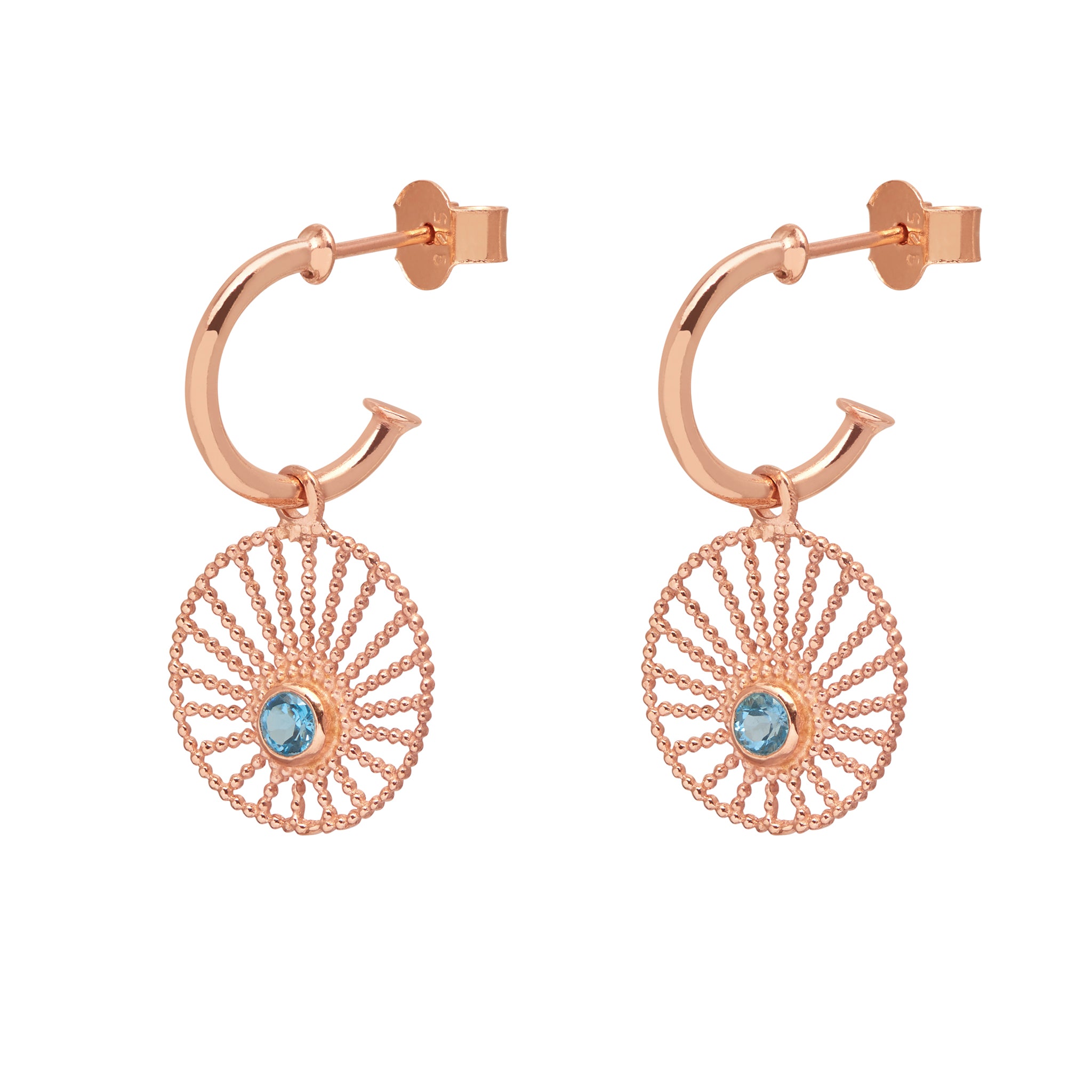 rose gold hoop earrings with a blue topaz and sun inspired design
