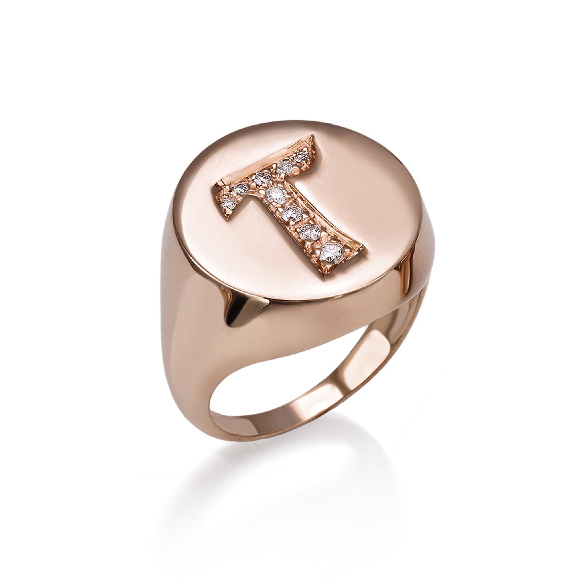A solid rose gold letter ring with diamond initals