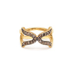 An 18ct gold vermeil on black rhodium setting, featuring a brown diamond oriental cross ring with a gold band.
