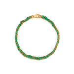 A 18ct gold plated vermeil and green friendship bracelet with a gold vermeil chain and silk thread, closed with a lobster clasp.