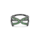 An 18ct gold vermeil ring with a black rhodium setting, featuring a cross design with green tsavorite