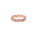 An 18ct rose gold eternity ring with white diamond accents from the Oriental Collection.