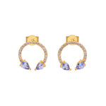 A pair of gold-plated sterling silver hoop earrings with purple tanzanite stones set within the hoops, featuring a horseshoe design.