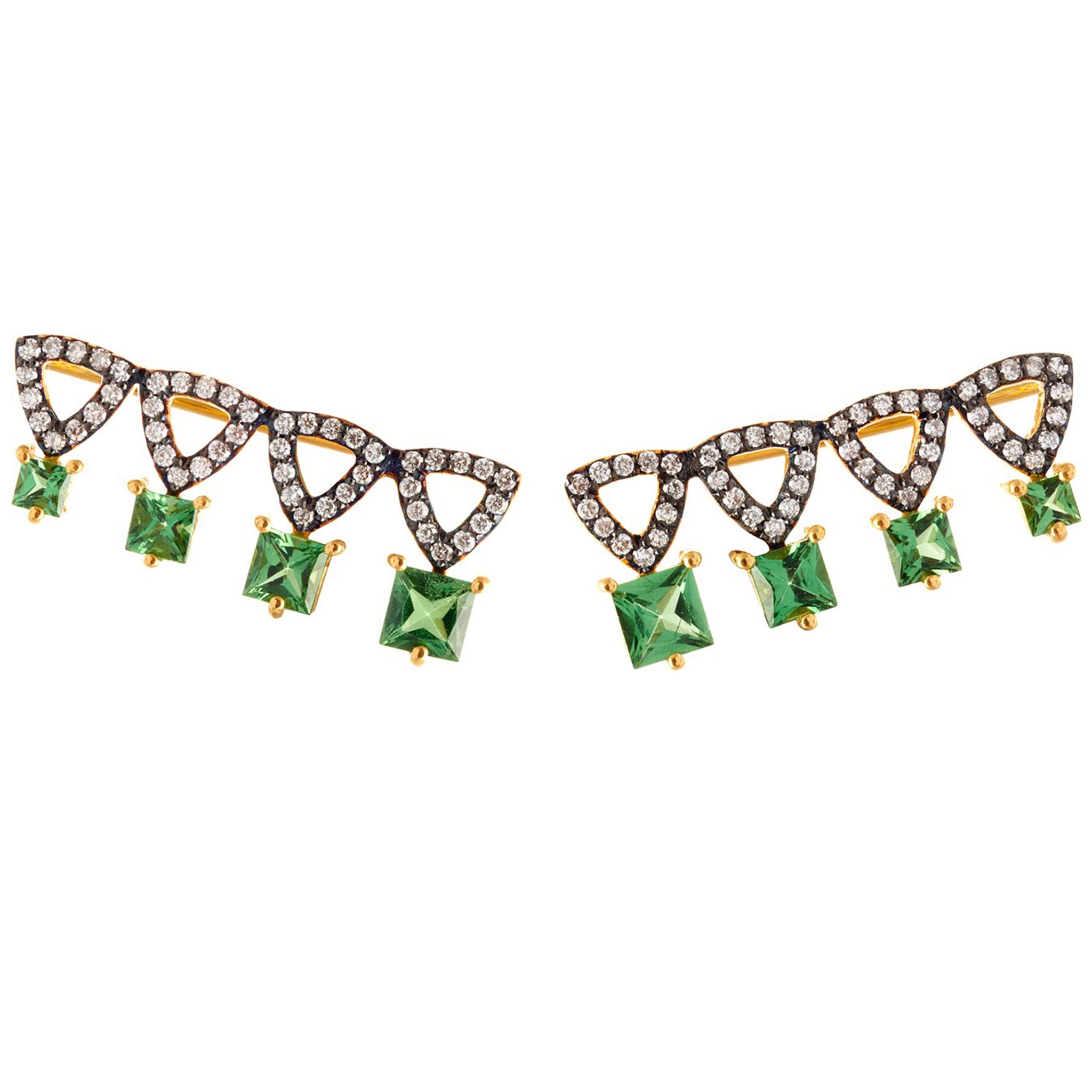 A pair of gold vermeil and rhodium-plated ear sliders with white diamonds and green tsavorite stones.