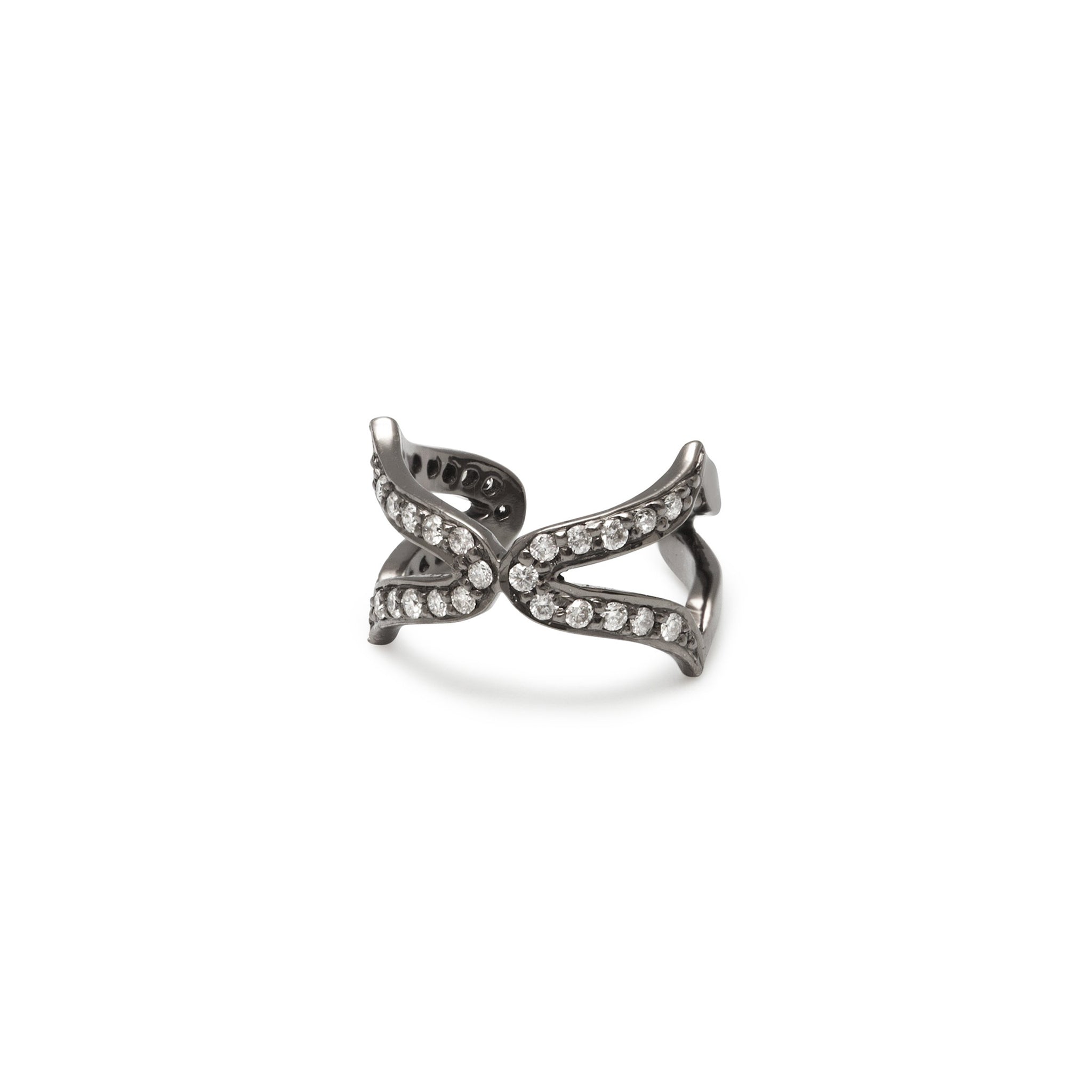 A black rhodium plated sterling silver ear cuff with white zircon stones designed in an oriental lotus flower-inspired pattern.