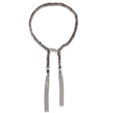 a sterling silver and black silk thread tassel bracelet with lobster clasp