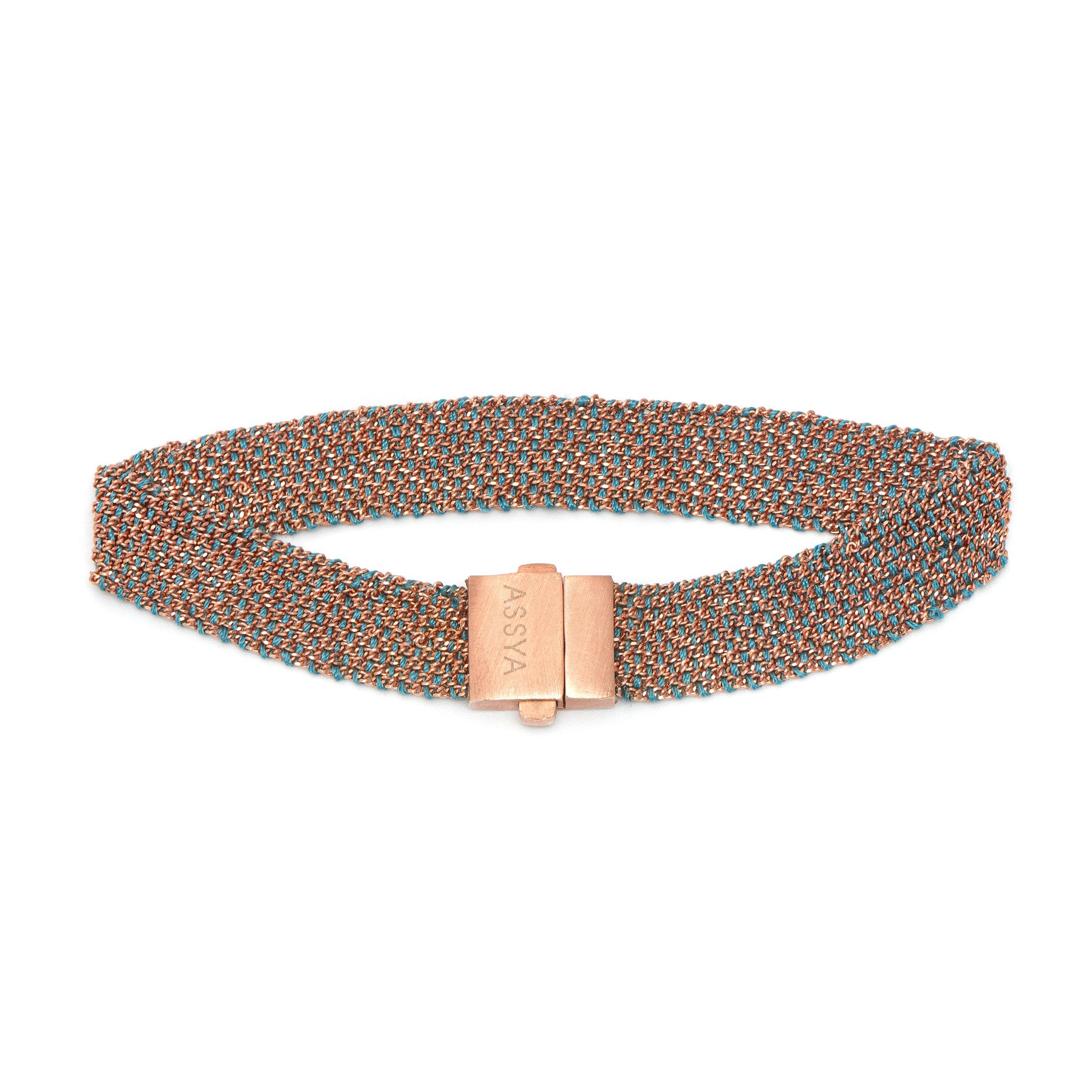 A rose gold and teal color silk weaved bracelet with a metallic clasp