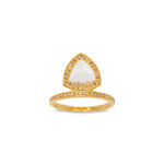 A gold vermeil ring featuring a pyramid shape with moonstone and grey diamond embellishments.