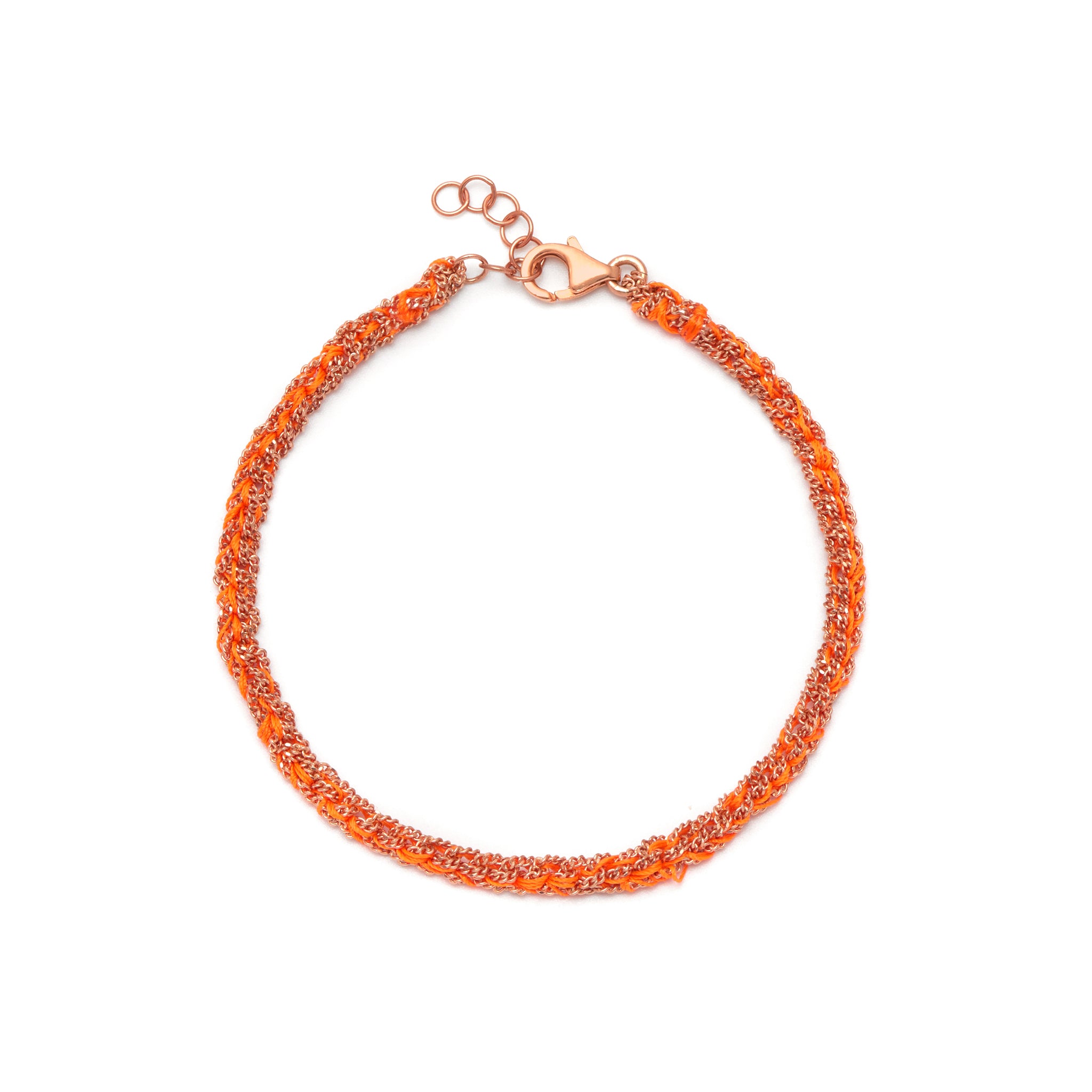 A hand-woven orange silk and 18ct rose gold plated silver friendship bracelet with a clasp.