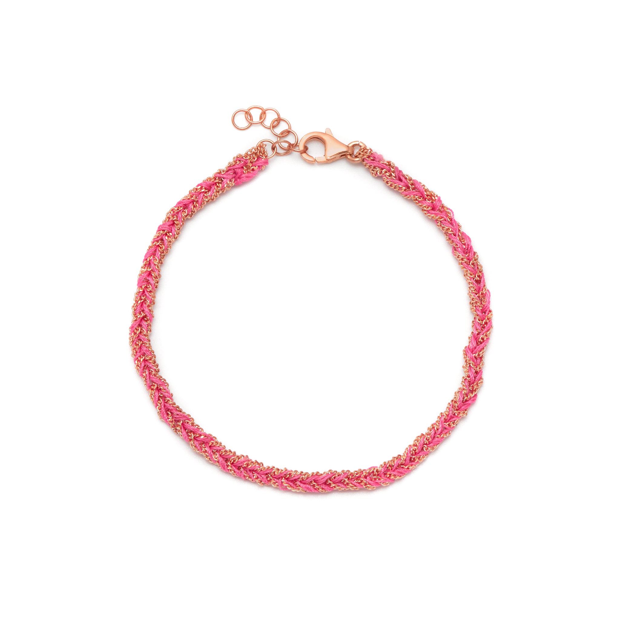 A hand-woven friendship bracelet in pink and 18ct rose gold colors, featuring silk thread and a gold vermeil chain.