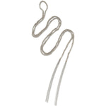 A silver and grey silk tassel necklace laid out on a plain background, showcasing its braided design and two tassel ends.