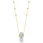 ASSYA Aquamarine Crystal Pendant necklace with blue topaz on white background. 
