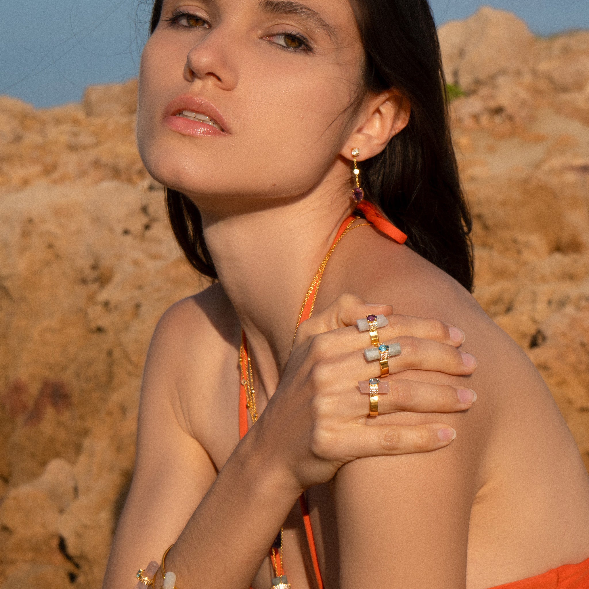 Model Wearing Assya London Crystal Rings in bathing suit